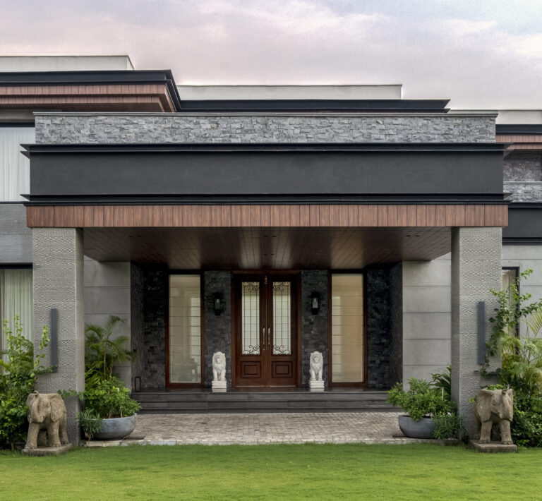 View of porch from front garden — interior design by Pochē Aesthetics, Delhi NCR