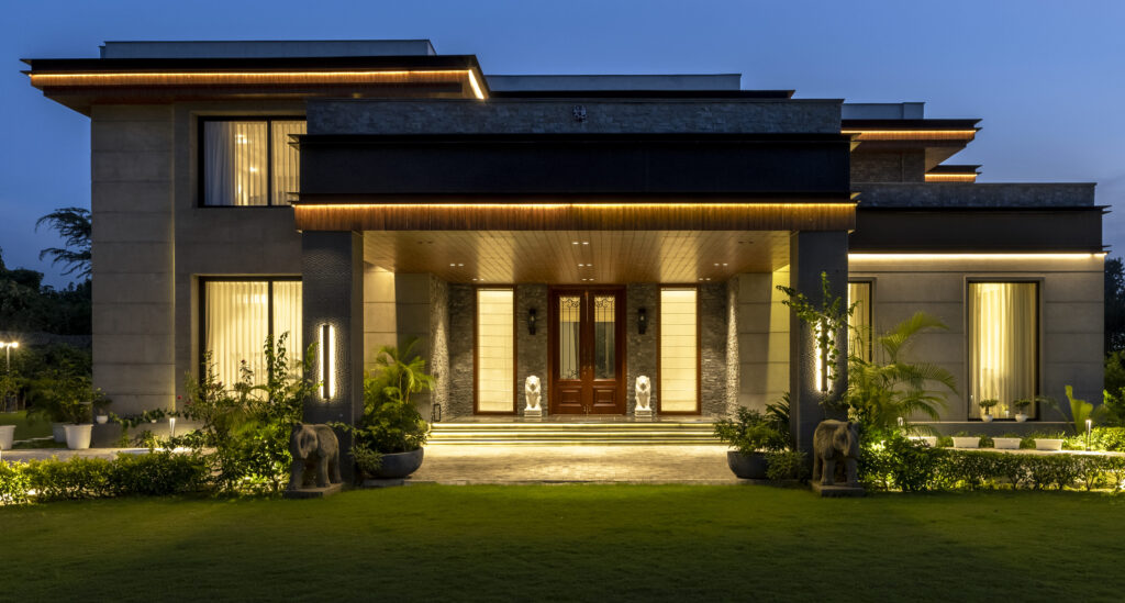 Evening elevation of a private residence by Pochē Aesthetics, Delhi NCR
