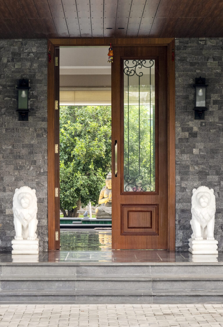 View of the water body through the main entrance — interior design by Pochē Aesthetics, Delhi NCR