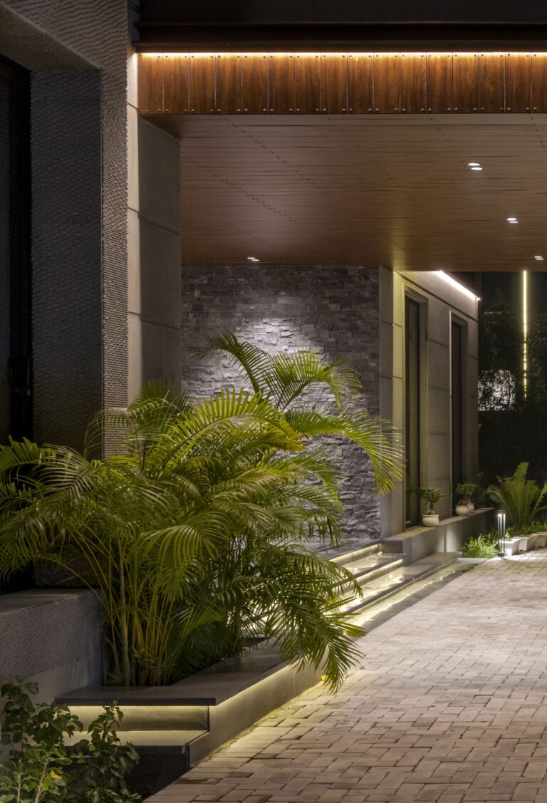 Detail shot of the driveway landscape — interior design by Pochē Aesthetics, Delhi NCR