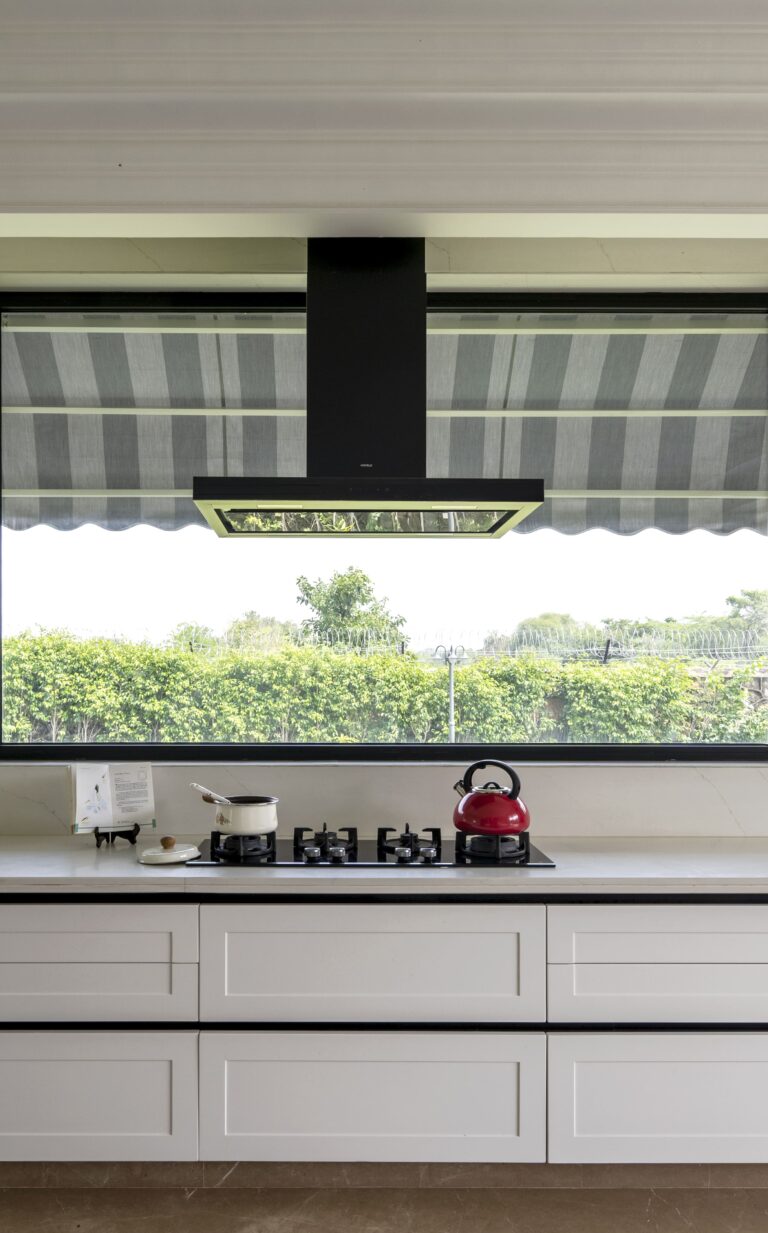 View of the kitchen — interior design by Pochē Aesthetics, Delhi NCR
